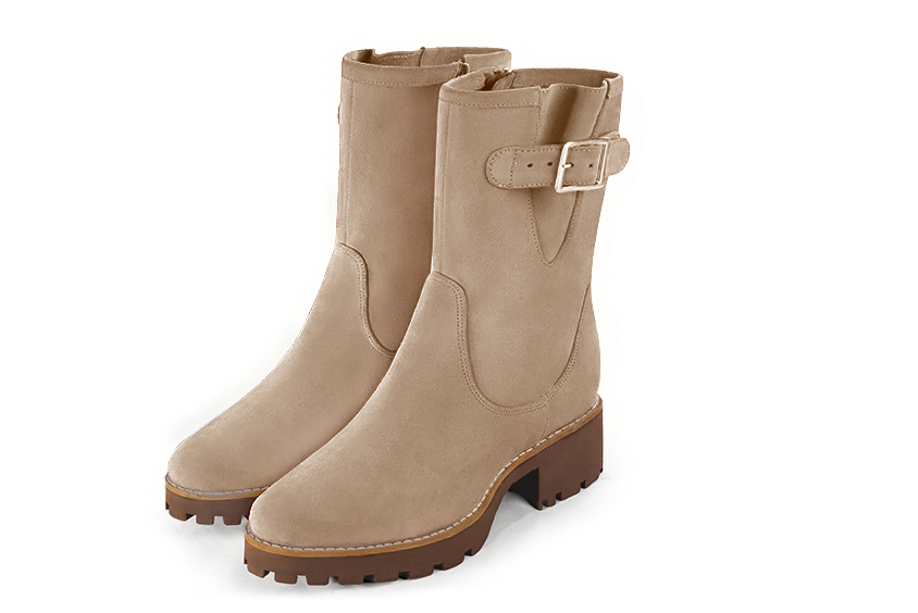 Tan beige women's ankle boots with buckles on the sides. Round toe. Low rubber soles. Front view - Florence KOOIJMAN